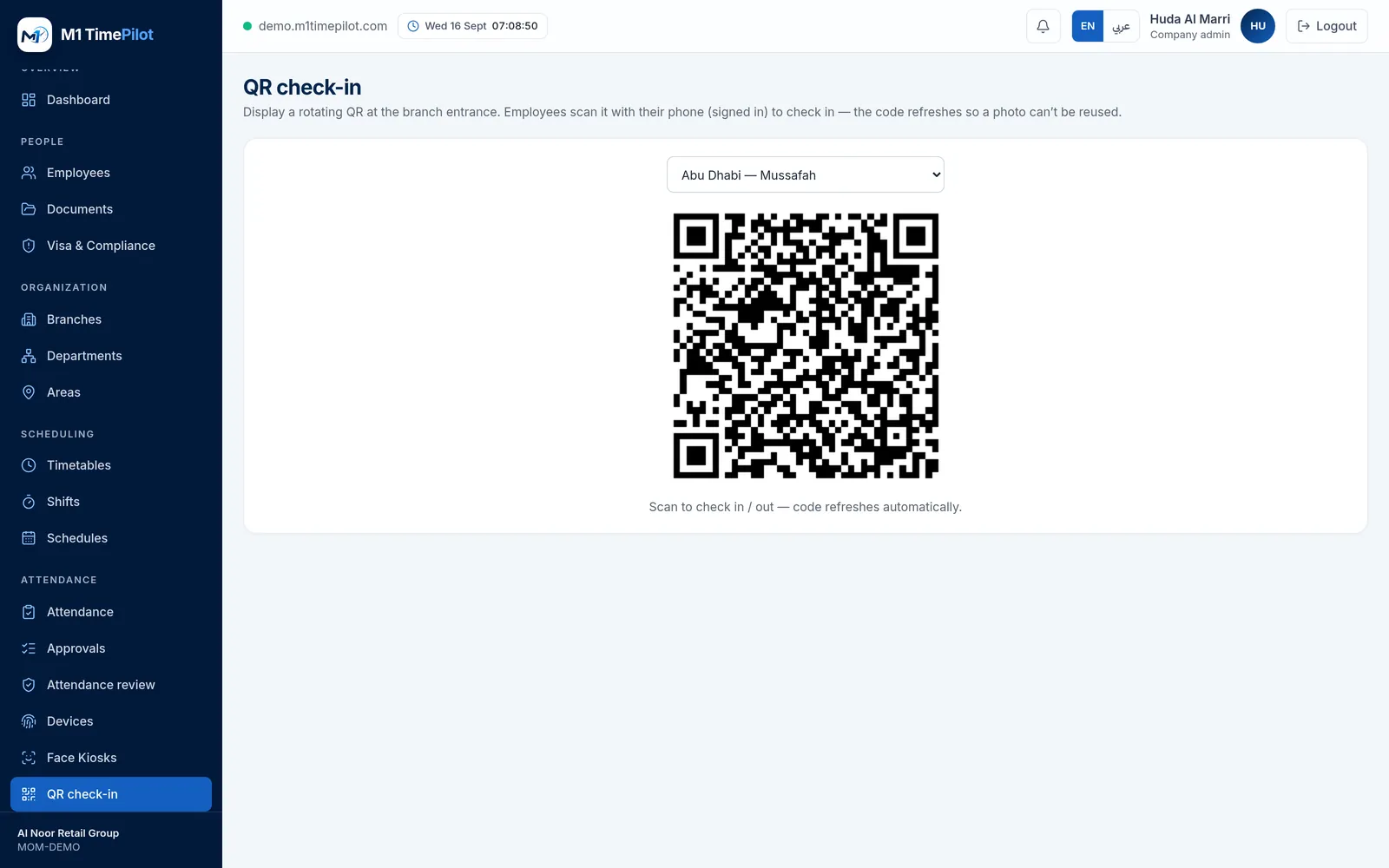 The QR check-in display screen in M1 TimePilot showing a rotating code for a branch entrance